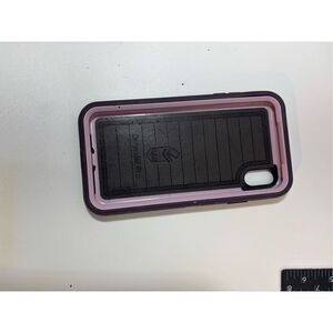 OtterBox Defender Pro case in purple with light pink accents. Designed for iPhon